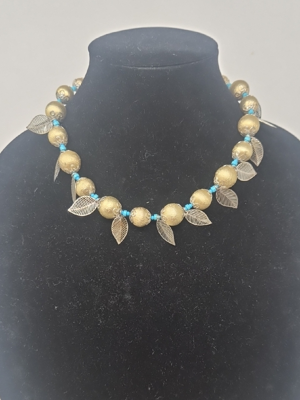 Vintage Gold Bead Necklace with Turquoise Accents and Leaf Charms